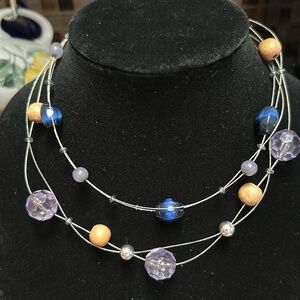 Mixed material floating necklace. Vintage 90’s. Wood, plastic, glass beads.